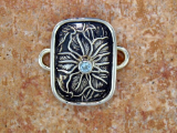 TABRA SILVER FLOWER EMBOSSED WITH BLUE TOPAZ CONNECTOR CHARM
