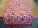 TAN AND RED HONEYCOMB TABLE RUNNER